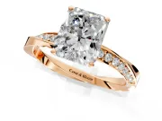 Side Accent Engagement Ring Setting for Radiant Cut Center with Accent Shoulders and Prong Head in Rose Gold