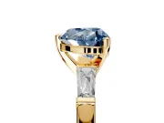 3 Stone Engagement Ring Setting for Fancy Blue Heart-Shaped Center with Tapered Baguettes, Plain Band and Prong Head in Yellow Gold