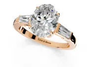 3 Stone Engagement Ring Setting for Oval Center with Baguette Accents and Prong Head in Rose Gold