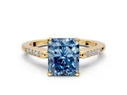 Solitaire Engagement Ring Setting for Fancy Blue Radiant Cut Center with Channel Accents and Prong Head in Yellow Gold
