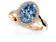 Halo Engagement Ring Setting for Fancy Blue Oval Center with Twist Band and Prong Head in Rose Gold