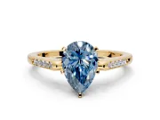 Solitaire Engagement Ring Setting for Fancy Blue Pear-Shaped Center with Channel Accents and Prong Head in Yellow Gold