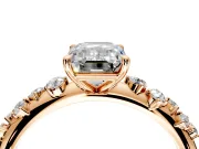 Cluster Engagement Ring Setting for Emerald Cut Center with Round Cut Accent Band and Prong Head in Rose Gold