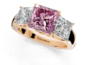 3 Stone Engagement Ring Setting for Fancy Pink Princess Cut Center with Raised Basket Heads and Prong Head in Rose Gold