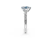 Solitaire Engagement Ring Setting for Fancy Blue Pear-Shaped Center with Trailing Leaf Accent Band and Prong Head in Platinum