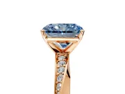 Side Accent Engagement Ring Setting for Fancy Blue Radiant Cut Center with Accent Shoulders and Prong Head in Rose Gold