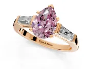 3 Stone Engagement Ring Setting for Fancy Pink Pear-Shaped Center with Tapered Baguettes, Plain Band and Prong Head in Rose Gold
