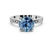 Solitaire Engagement Ring Setting for Fancy Blue Round Cut Center with Milgrain X Pattern Band and Prong Head in White Gold