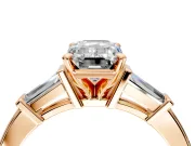 3 Stone Engagement Ring Setting for Emerald Cut Center with Channel Baguette Accents and Prong Head in Rose Gold
