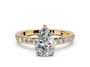 Solitaire Engagement Ring Setting for Pear-Shaped Center with Round Cut Pave Band and Prong Head in Yellow Gold