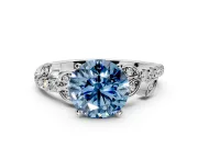 Leaf Motif Engagement Ring Setting for Fancy Blue Round Cut Center with Pave Band and Prong Head in Platinum