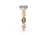 Solitaire Engagement Ring Setting for Fancy Blue Pear-Shaped Center with Accented Twist Band and Leaf Prong Head in Rose Gold