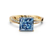 Side Accent Engagement Ring Setting for Fancy Blue Princess Cut Center with Accent Shoulders and Prong Head in Yellow Gold