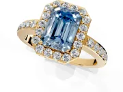 Halo Engagement Ring Setting for Fancy Blue Emerald Cut Center with Heart-Shaped Openwork, Pave Band and Prong Head in Yellow Gold
