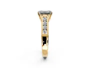 Solitaire Engagement Ring Setting for Emerald Cut Center with Round Cut Channel Band and Prong Head in Yellow Gold