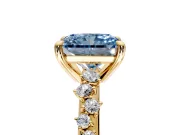 Solitaire Engagement Ring Setting for Fancy Blue Radiant Cut Center with Trailing Leaf Accent Band and Prong Head in Yellow Gold