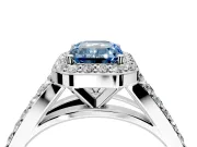 Halo Engagement Ring Setting for Fancy Blue Emerald Cut Center with Narrow Pave Split Shank and Prong Head in Platinum