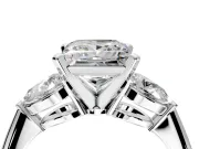 3 Stone Engagement Ring Setting for Princess Cut Center with Large Pear-Shaped Accents and Prong Head in Platinum