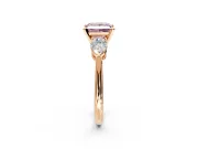 3 Stone Engagement Ring Setting for Fancy Pink Princess Cut Center with Large Pear-Shaped Accents and Prong Head in Rose Gold