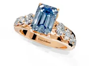 Solitaire Engagement Ring Setting for Fancy Blue Emerald Cut Center with Graduated Shared Prongs and Prong Head in Rose Gold