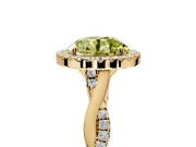 Halo Engagement Ring Setting for Fancy Yellow Round Cut Center with Twist Band and Prong Head in Yellow Gold