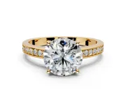 Solitaire Engagement Ring Setting for Round Cut Center with Channel-Set Accent Band and Prong Head in Yellow Gold