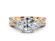3 Stone Engagement Ring Setting for Round Cut Center with Pave Split Shank and Prong Head in Rose Gold