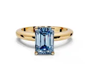 Solitaire Engagement Ring Setting for Fancy Blue Emerald Cut Center with Wire Band and Prong Head in Yellow Gold