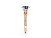 3 Stone Engagement Ring Setting for Fancy Blue Round Cut Center with Round Cut Side Accents and Prong Head in Rose Gold