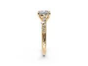 Solitaire Engagement Ring Setting for Cushion Cut Center with Trailing Leaf Accent Band and Prong Head in Yellow Gold