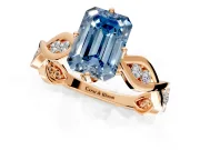 Solitaire Engagement Ring Setting for Fancy Blue Emerald Cut Center with Accented Twist Band and Leaf Prong Head in Rose Gold