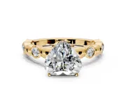 Solitaire Engagement Ring Setting for Heart-Shaped Center with Beaded Bezel Station Band and Prong Head in Yellow Gold