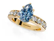 Solitaire Engagement Ring Setting for Fancy Blue Pear-Shaped Center with Channel-Set Accents and Prong Head in Yellow Gold