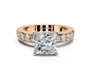 Solitaire Engagement Ring Setting for Princess Cut Center with Channel-Set Accents and Prong Head in Rose Gold