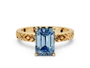 Solitaire Engagement Ring Setting for Fancy Blue Emerald Cut Center with Milgrain X Pattern Band and Prong Head in Yellow Gold