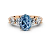 5 Stone Engagement Ring Setting for Fancy Blue Oval Center with Graduated Accents and Prong Head in Rose Gold
