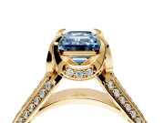 Solitaire Engagement Ring Setting for Fancy Blue Emerald Cut Center with Accented Split Shank and Prong Head in Yellow Gold