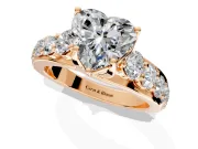 Solitaire Engagement Ring Setting for Heart-Shaped Center with Graduated Shared Prongs and Prong Head in Rose Gold