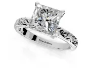 Solitaire Engagement Ring Setting for Princess Cut Center with Scrollwork Band and Prong Head in Platinum