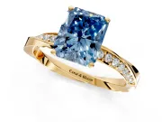 Side Accent Engagement Ring Setting for Fancy Blue Radiant Cut Center with Accent Shoulders and Prong Head in Yellow Gold