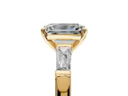 3 Stone Engagement Ring Setting for Emerald Cut Center with Tapered Baguettes, Plain Band and Prong Head in Yellow Gold