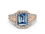 Halo Engagement Ring Setting for Fancy Blue Emerald Cut Center with Narrow Pave Split Shank and Prong Head in Rose Gold