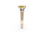 Channel-Set Engagement Ring Setting for Fancy Yellow Pear-Shaped Center with Baguette Band and Prong Head in Rose Gold