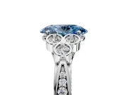 Cluster Engagement Ring Setting for Fancy Blue Oval Center with Bezel Accent Clusters and Prong Head in White Gold