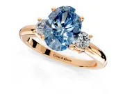 3 Stone Engagement Ring Setting for Fancy Blue Oval Center with Wide Plain Band and Prong Head in Rose Gold