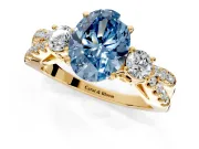 3 Stone Engagement Ring Setting for Fancy Blue Oval Center with Pave Split Shank and Prong Head in Yellow Gold