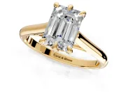 Solitaire Engagement Ring Setting for Emerald Cut Center with Cathedral Band and Prong Head in Yellow Gold