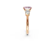 3 Stone Engagement Ring Setting for Fancy Pink Radiant Cut Center with Large Pear-Shaped Accents and Prong Head in Rose Gold