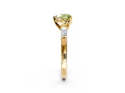 3 Stone Engagement Ring Setting for Fancy Yellow Heart-Shaped Center with Tapered Baguettes, Plain Band and Prong Head in Yellow Gold