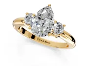 3 Stone Engagement Ring Setting for Pear-Shaped Center with Wide Plain Band and Prong Head in Yellow Gold